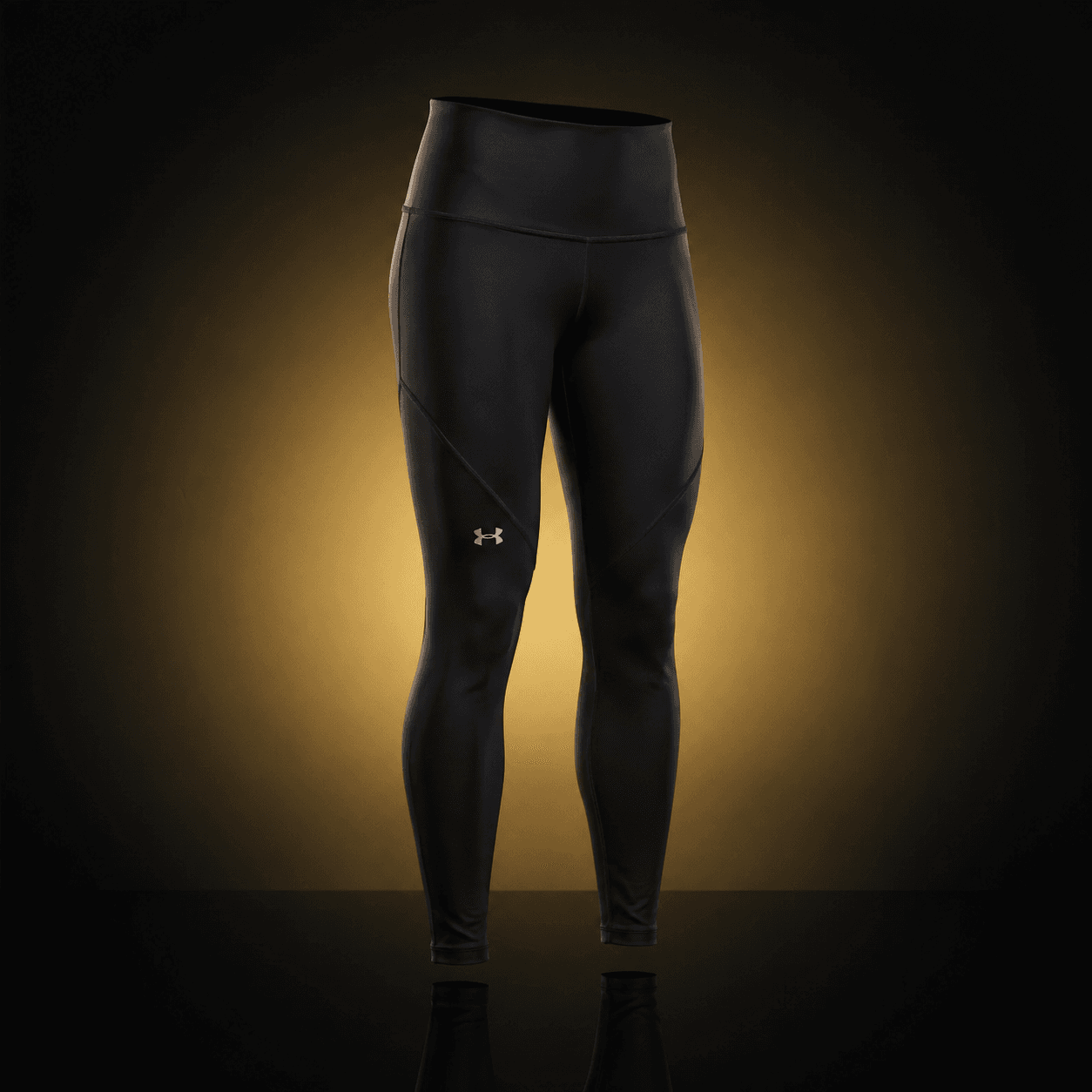 Leggings Under Armour negros con halo dorado